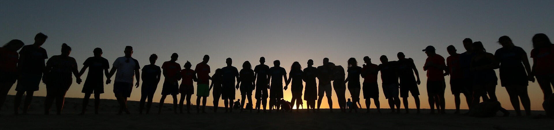 Silhouette of group of happy people