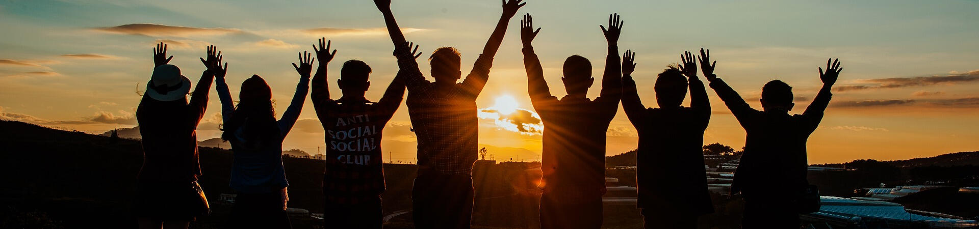 Silhouette of group of happy people